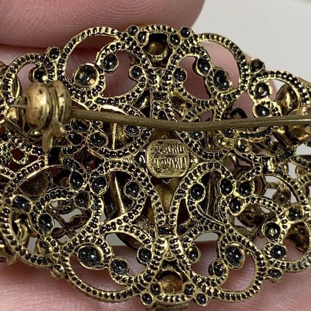 Vintage Brooch Czech Gold Tone Filigree Pin Green Stones Ornate Jewelry 1.25”